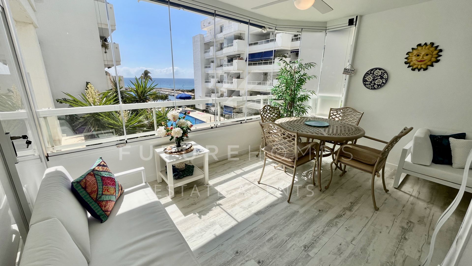 Immaculate apartment located next to Estepona port with private underground parking included.
