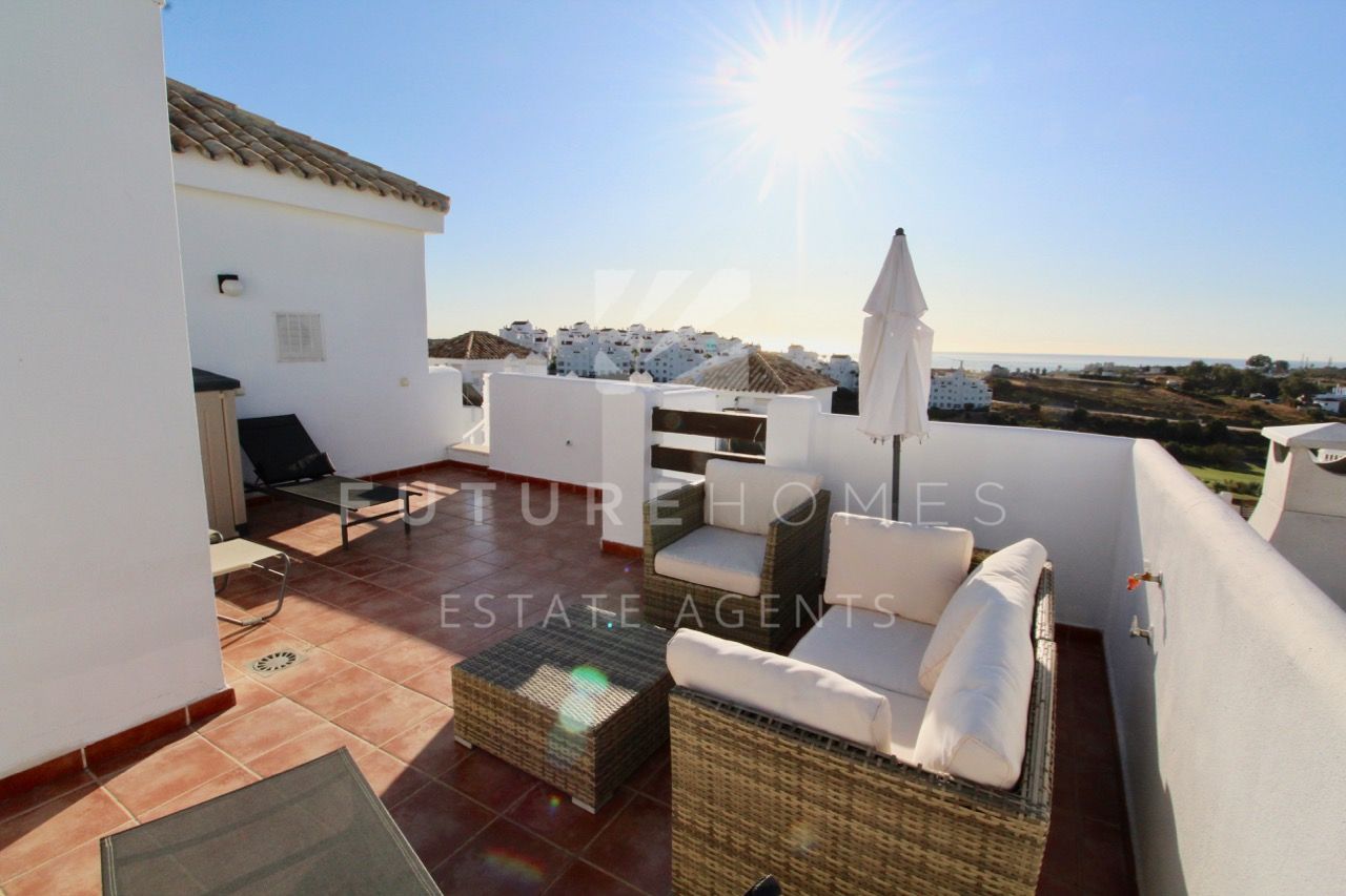 Modern penthouse apartment with golf and sea views!