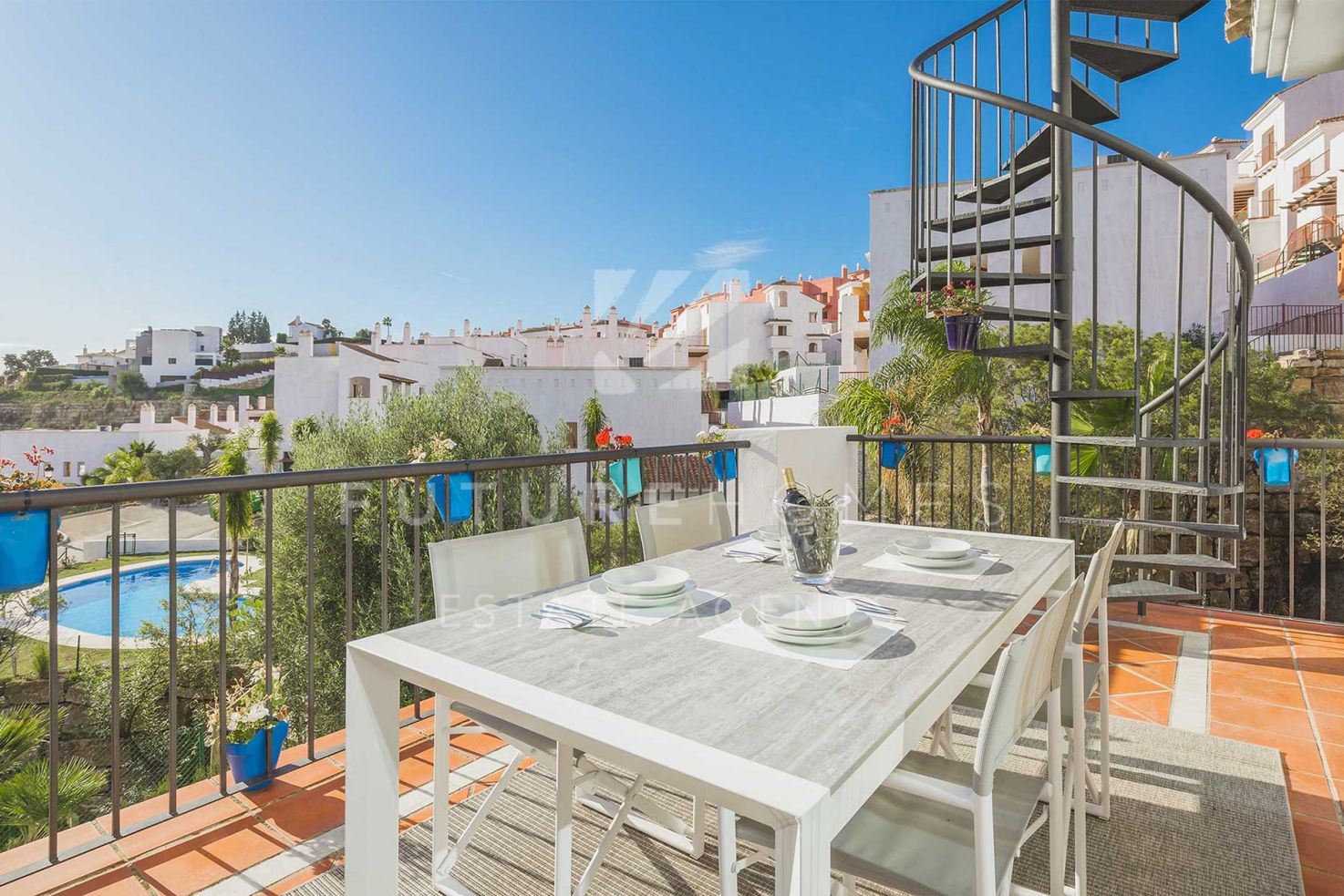 Beautiful Andalusian style penthouse with solarium located within a new gated community in El Paraiso, Benahavis