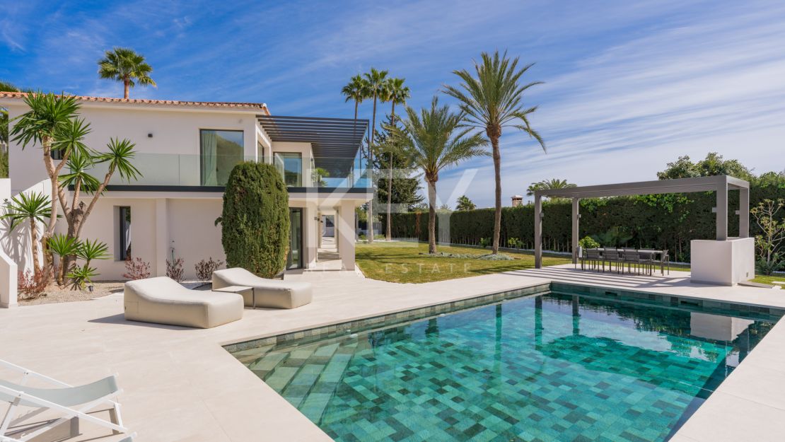 Exquisita residencia en la Milla de Oro con vistas panorámicas al mar y a la montaña