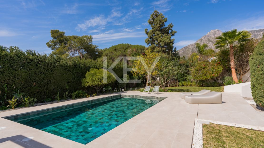 Exquisita residencia en la Milla de Oro con vistas panorámicas al mar y a la montaña