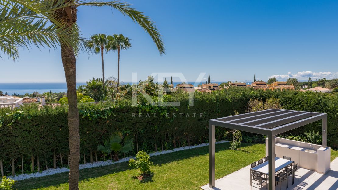 Exquisita residencia en la Milla de Oro con vistas panorámicas al mar y a la montaña