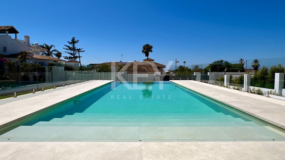 Contemporary beachside villa with sea views and smart design in Elviria, Marbella East