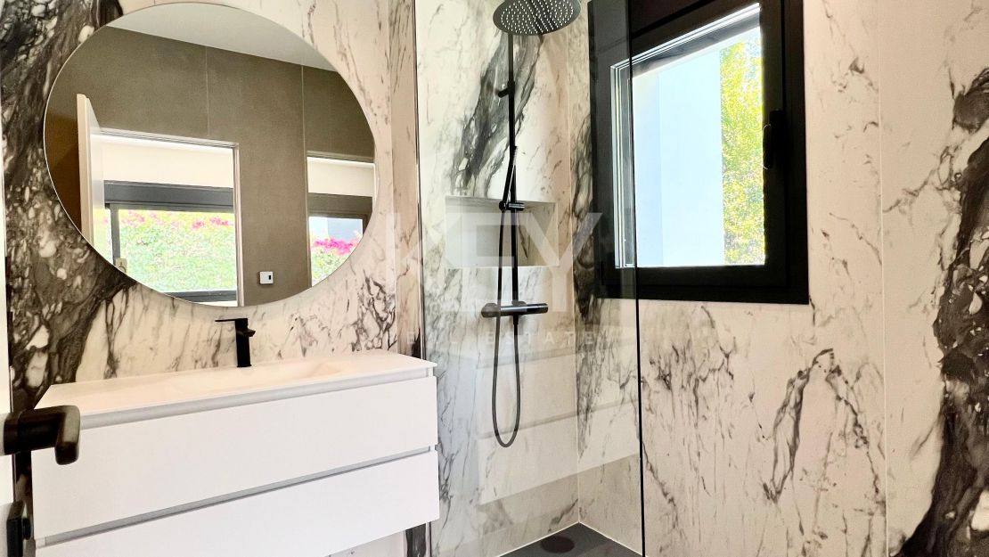 Contemporary beachside villa with sea views and smart design in Elviria, Marbella East