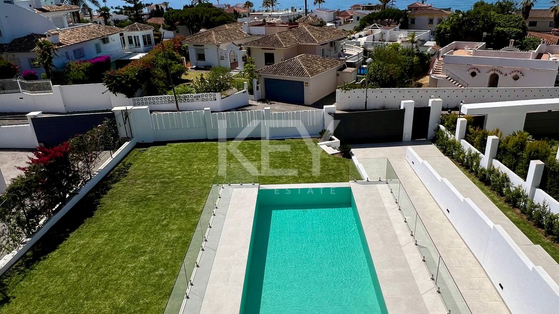 Contemporary beachside villa with sea views and smart design in Elviria, Marbella East