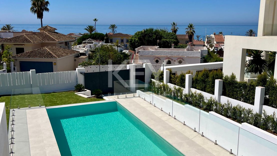 Contemporary beachside villa with sea views and smart design in Elviria, Marbella East