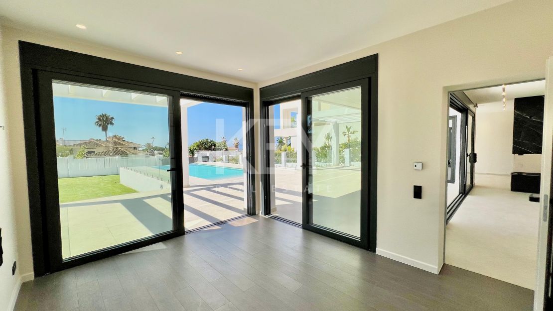 Contemporary beachside villa with sea views and smart design in Elviria, Marbella East
