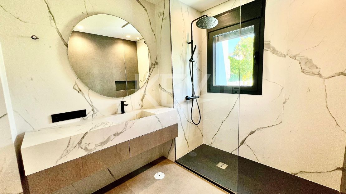 Contemporary beachside villa with sea views and smart design in Elviria, Marbella East