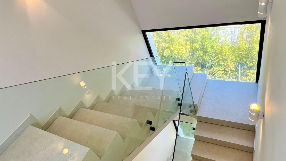 Contemporary beachside villa with sea views and smart design in Elviria, Marbella East