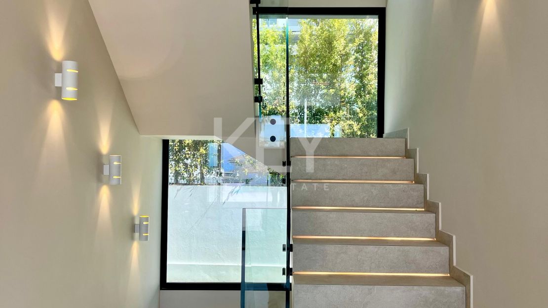 Contemporary beachside villa with sea views and smart design in Elviria, Marbella East