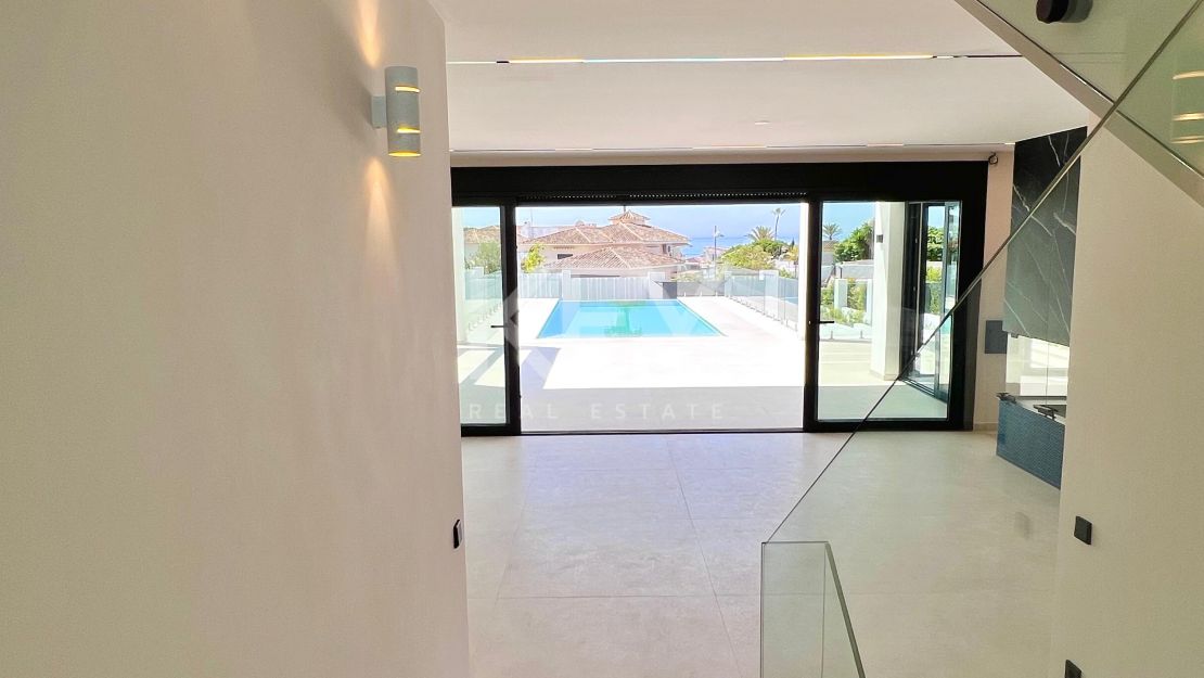 Contemporary beachside villa with sea views and smart design in Elviria, Marbella East