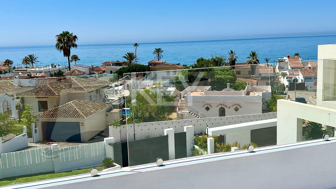 Contemporary beachside villa with sea views and smart design in Elviria, Marbella East