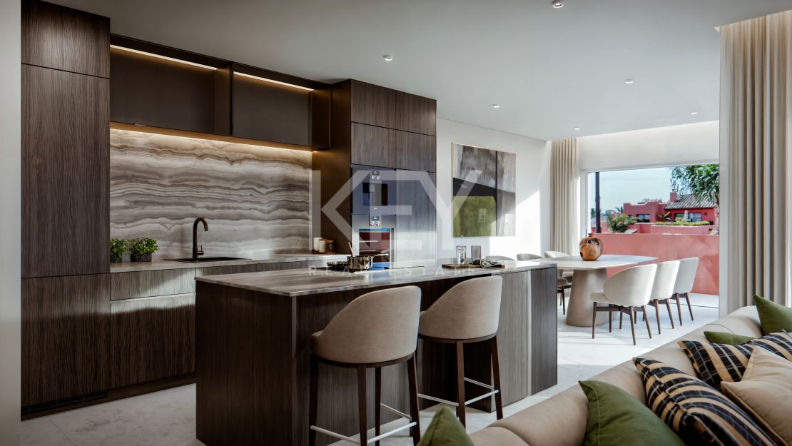 Apartamento de lujo en primera línea de playa con jardines tropicales y vistas al mar