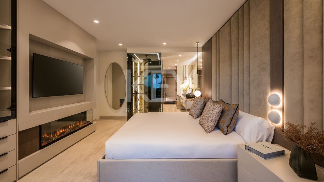 Apartamento junto a la playa con terraza privada y vistas al mar en Estepona