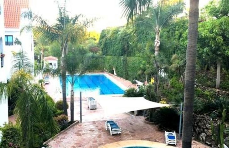 Two-story townhouse located in the La Maestraza urbanization in Nueva Andalucía, Marbella