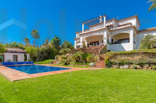 Elegant family villa with stunning panoramic sea views over 2 golf courses and the mountains beyond.