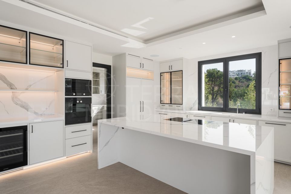 Striking Four-Level Designer Villa with Sea & Golf Views in La Resina Golf