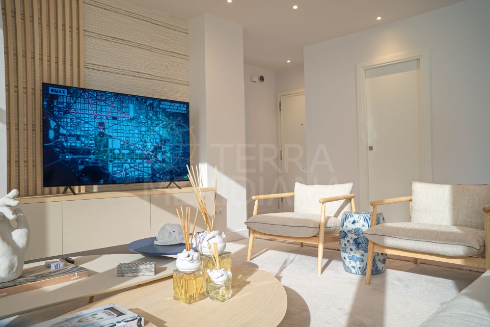 Extensively renovated beachfront apartment with postcard-perfect views for sale in Estepona Centre