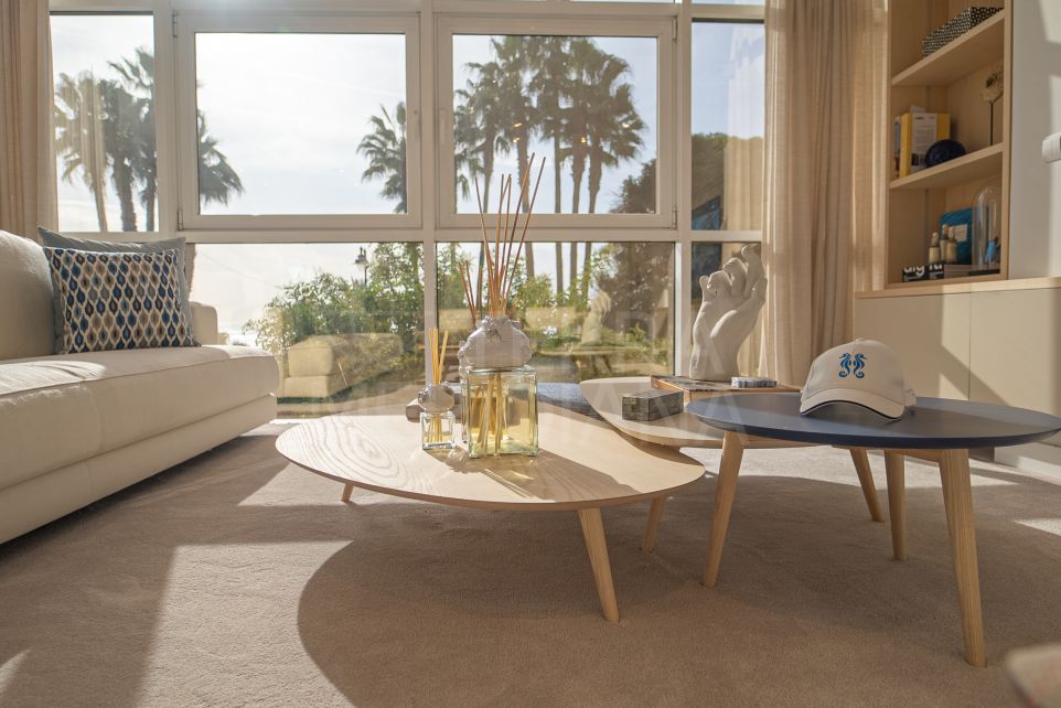 Extensively renovated beachfront apartment with postcard-perfect views for sale in Estepona Centre