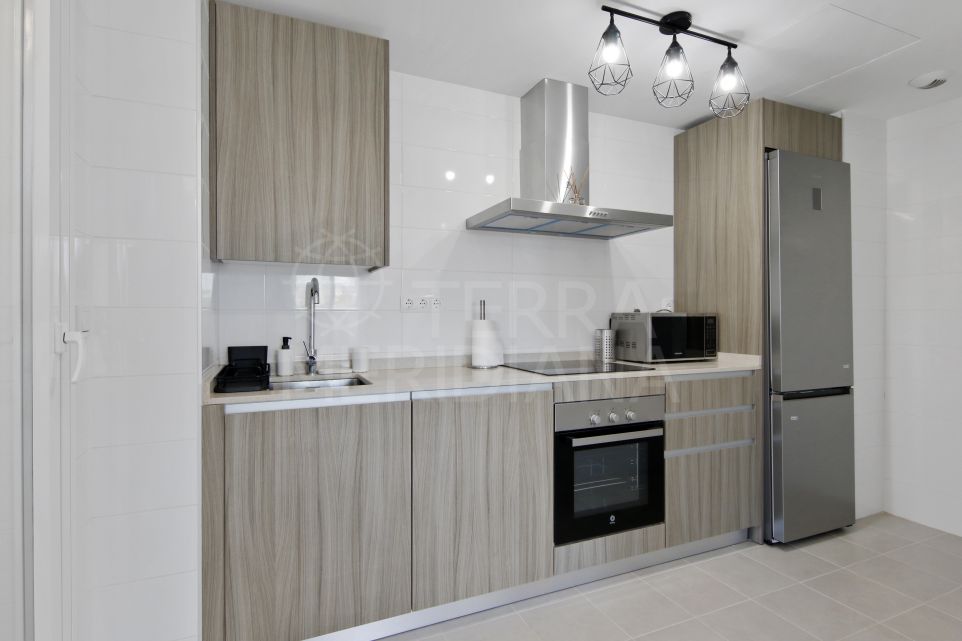 Brand new apartment for long term rent in Estepona with 2 bedrooms, parking and communal pool