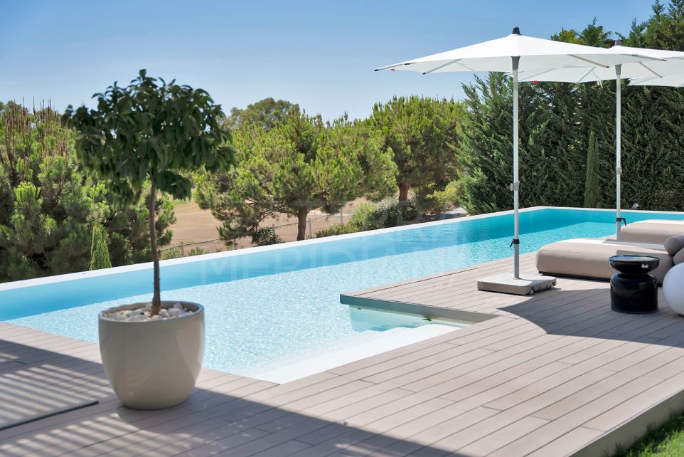 Exclusive Contemporary Villa in Private Community with Stunning Golf Views.
