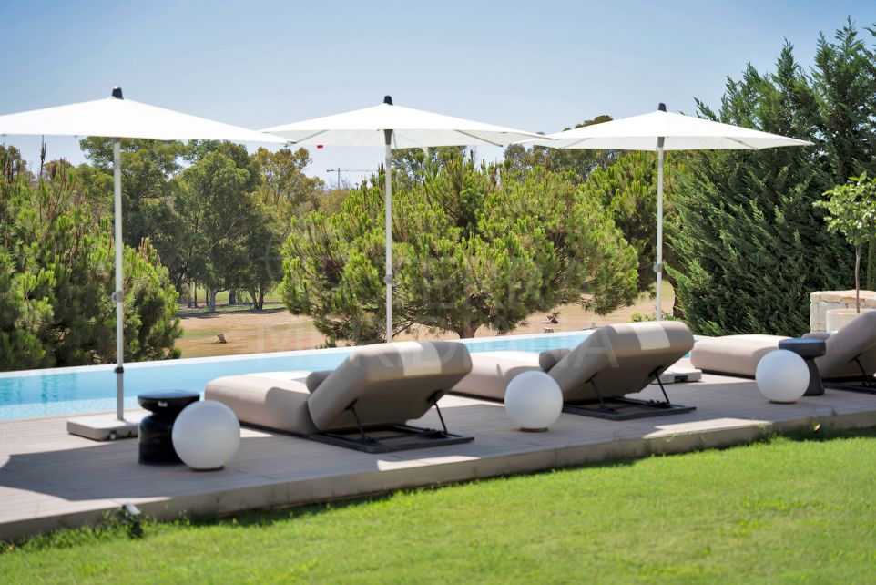 Exclusive Contemporary Villa in Private Community with Stunning Golf Views.