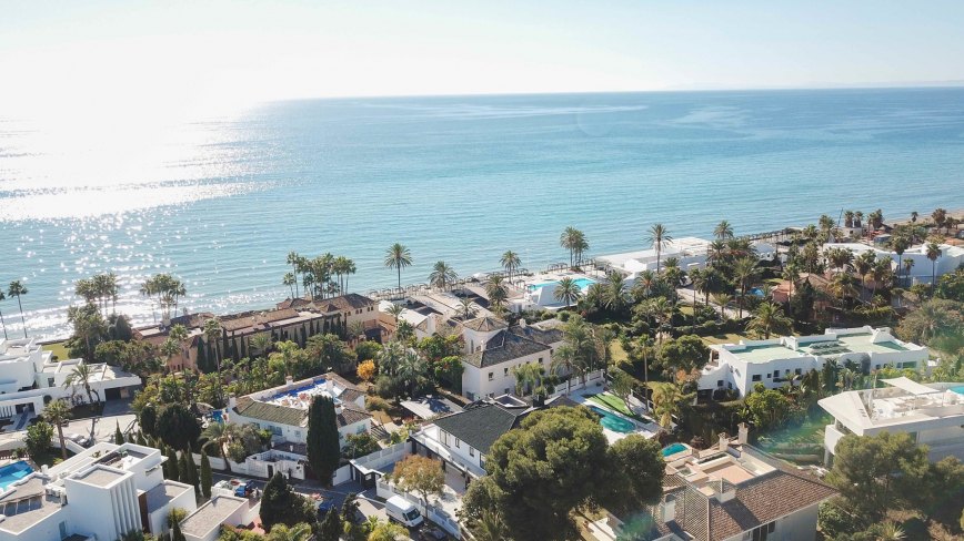 A aerial view of Los Monteros with sea views in the background