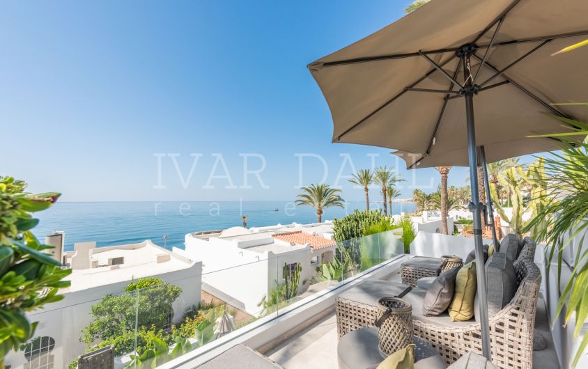 Scandi-style design bungalow in the beachfront Oasis Club on Marbella's Golden Mile.