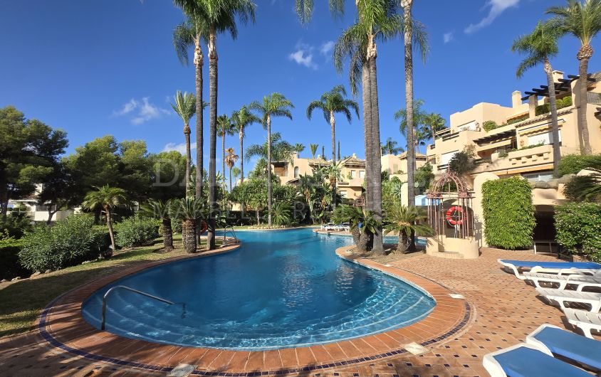 Bright two-bedroom apartment in El Alfar, Sierra Blanca, with large south and west facing wraparound terrace.