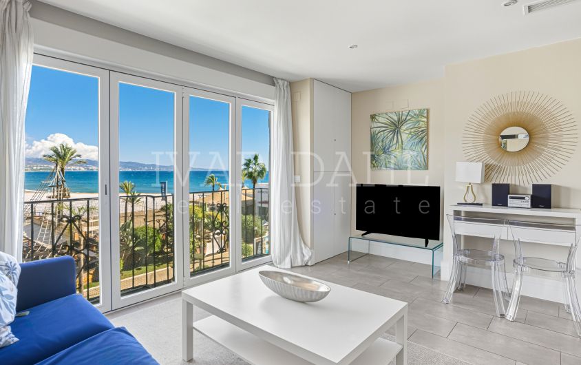 Two-bedroom, beachfront apartment with sea and mountain views, located in the heart of Puerto Banús.