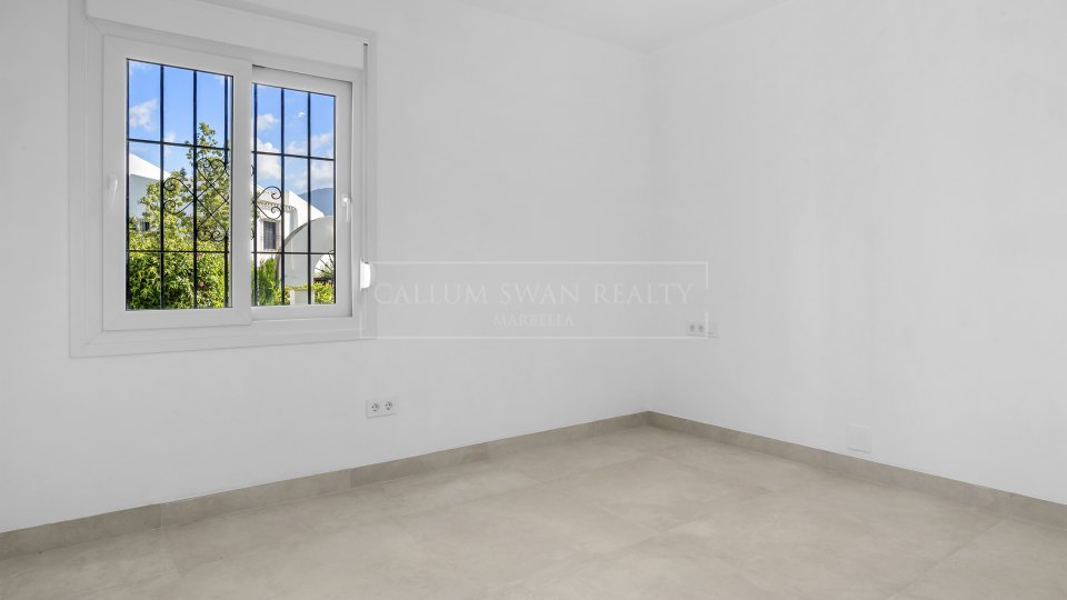 Nueva Andalucia, Appartement rénové en rez-de-chaussée avec accès au jardin à Malambo, Nueva Andalucía