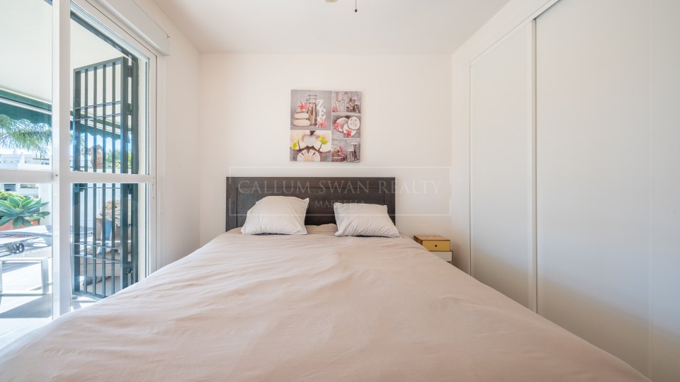 Nueva Andalucia, Appartement rénové de deux chambres au rez-de-chaussée à vendre à Nueva Andalucía