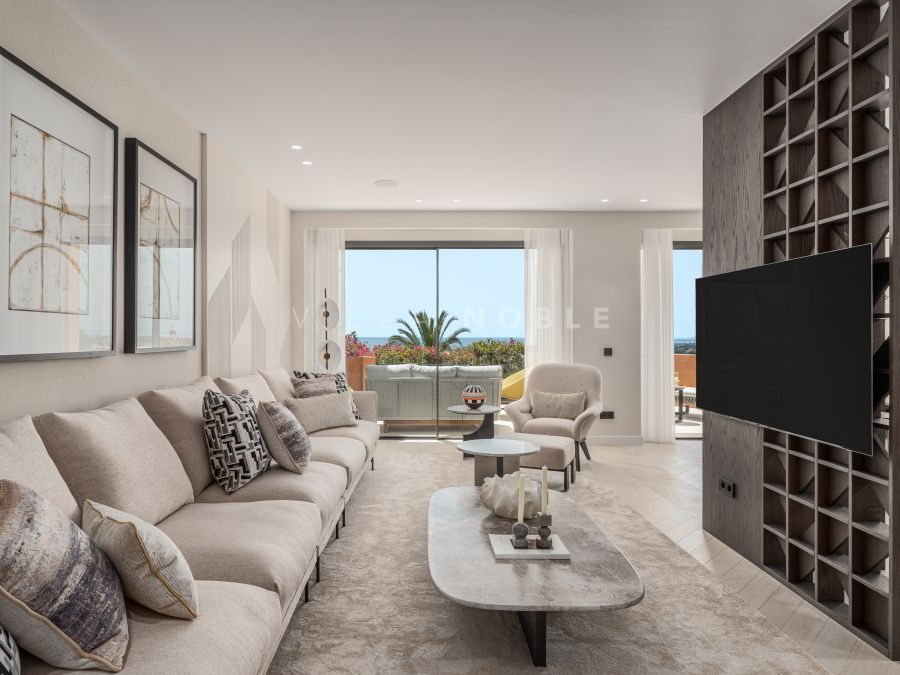 Elegante apartamento en planta baja elevada con vistas panorámicas al mar en Les Belvederes, La Cerquilla, Nueva Andalucía
