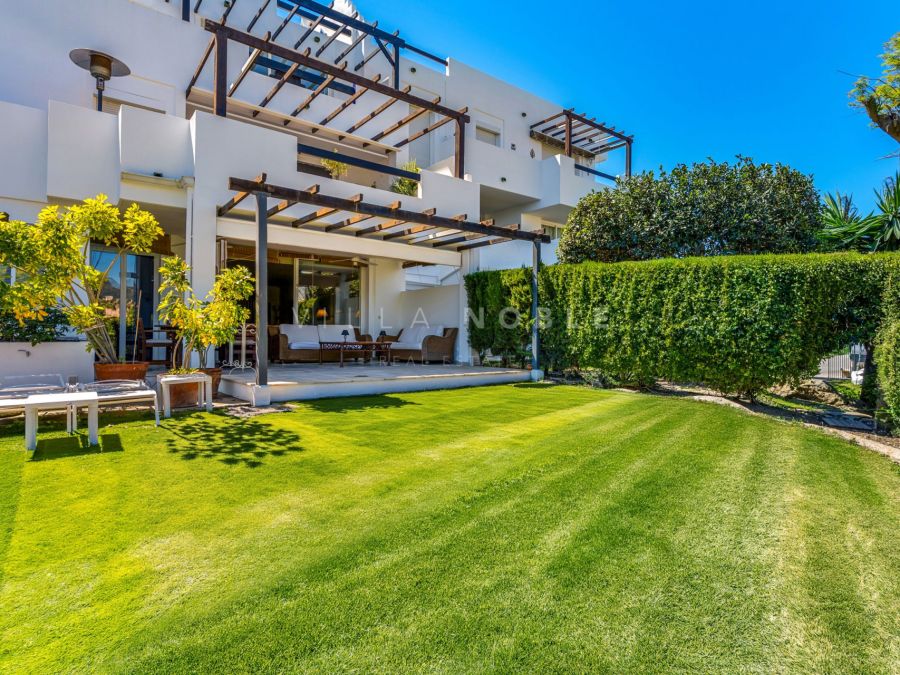 Spacious three-bedroom ground floor apartment located in the gated community of Las Jacarandas, Bel Air