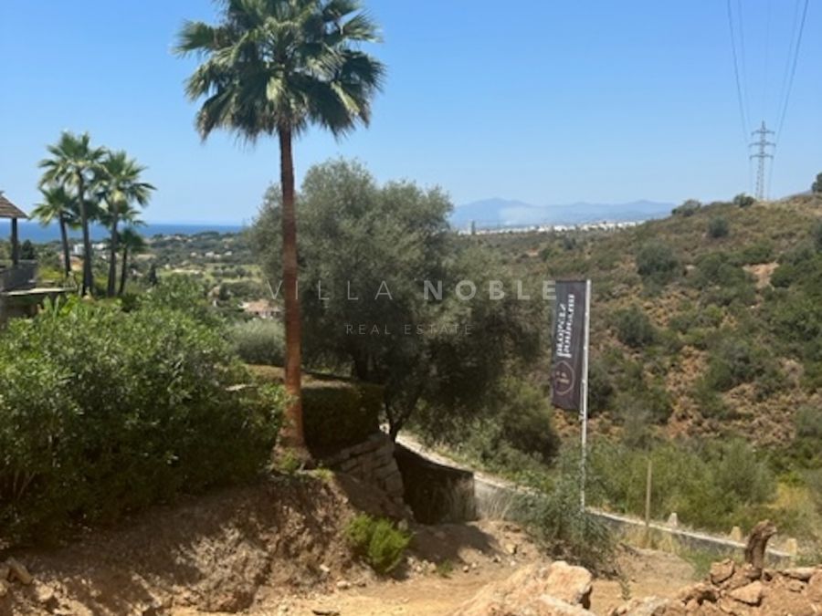 Plot in El Rosario, Marbella East with sea, golf and mountain views, close to amenities