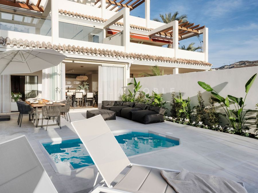 Renovated ground-floor apartment with panoramic views in Palacetes Los Belvederes, Nueva Andalucía