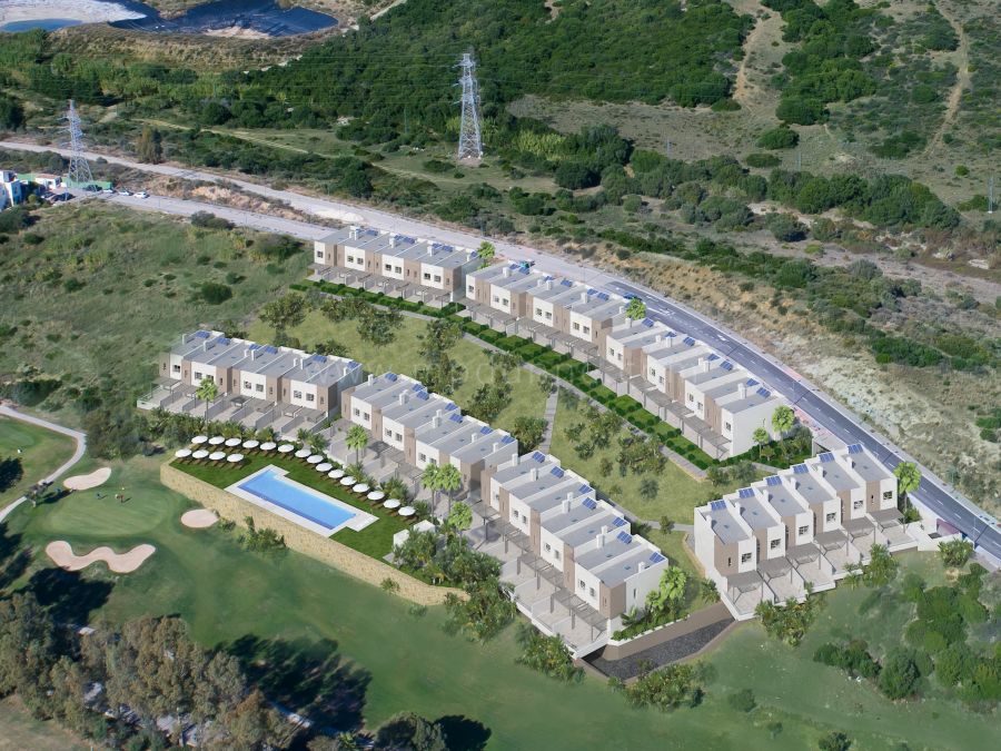 Modern townhouses in Estepona Golf with golf and sea views.
