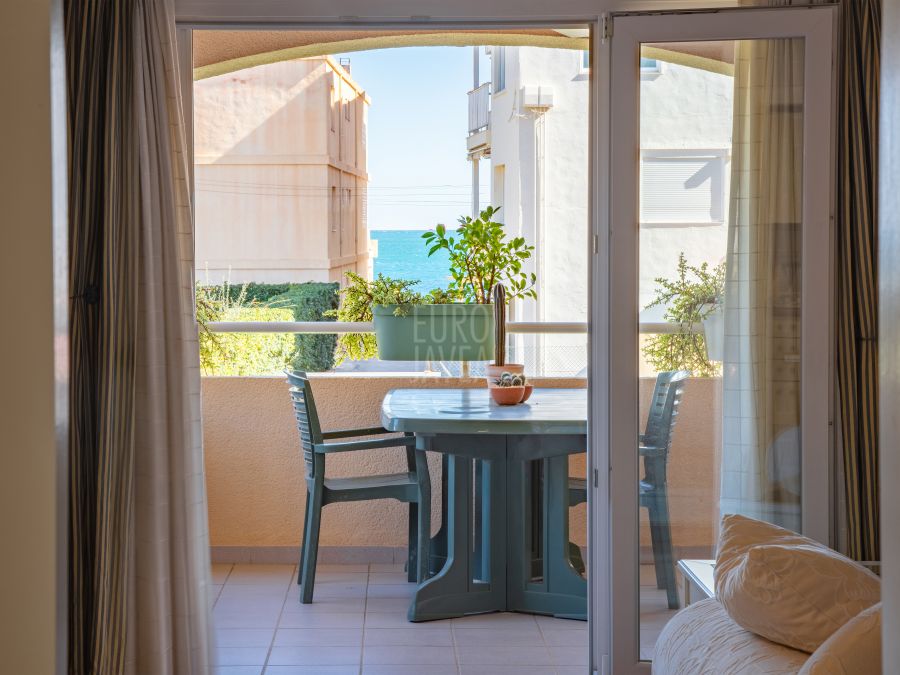 Apartment for sale just a few steps from Arenal Beach and the Port in Jávea, with direct access to the sea.