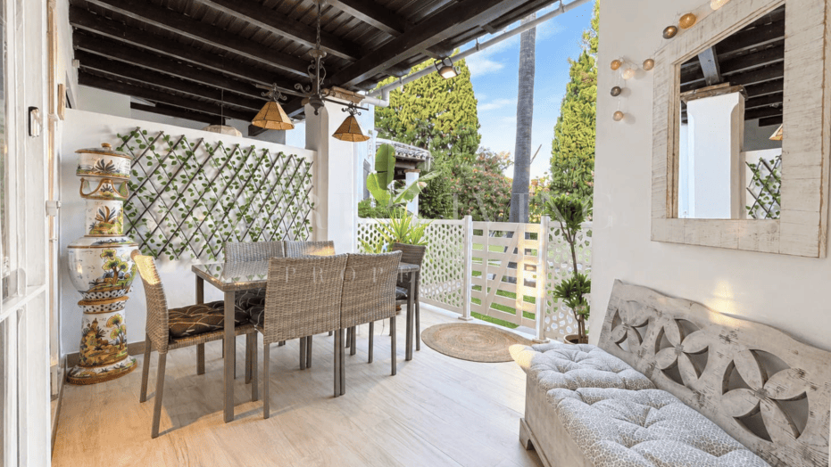 Refined golf-front townhouse with bright interiors & private solarium in prime Soleuropa, Nueva Andalucia