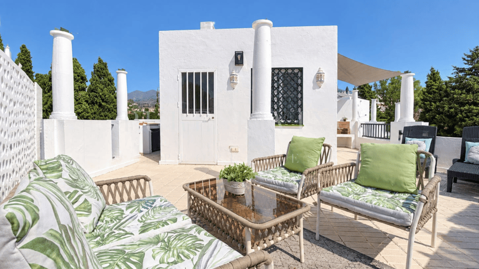 Refined golf-front townhouse with bright interiors & private solarium in prime Soleuropa, Nueva Andalucia