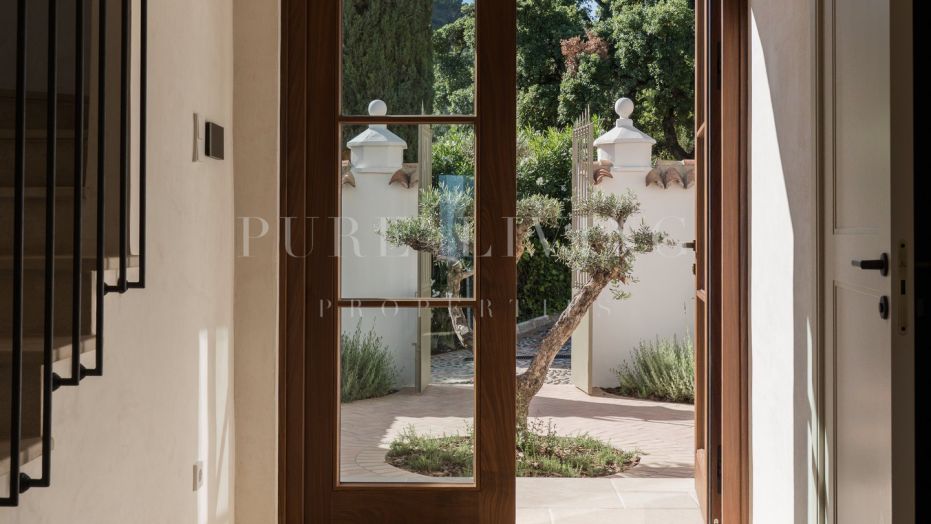 Timeless elegance meets modern luxury in this private Mediterranean retreat in the heart of El Madroñal.