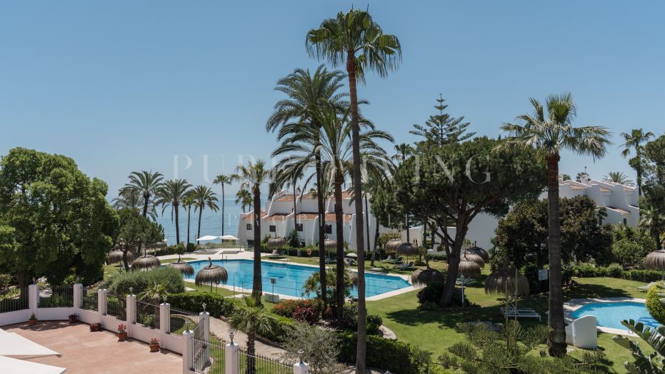 Uitzonderlijk appartement aan het strand in de exclusieve Coral Beach gemeenschap