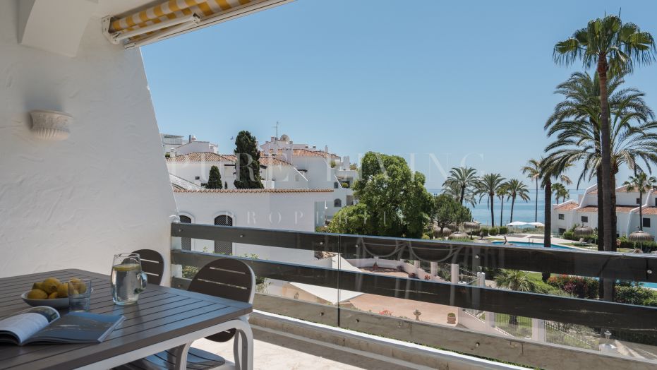 Uitzonderlijk appartement aan het strand in de exclusieve Coral Beach gemeenschap
