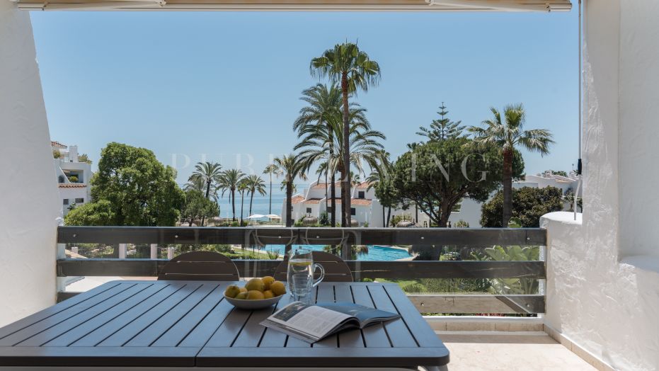 Uitzonderlijk appartement aan het strand in de exclusieve Coral Beach gemeenschap