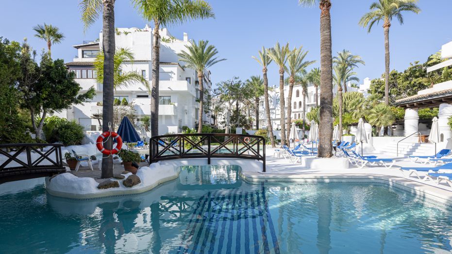 Charming two bedroom beachside apartment with pool views in the prestigious La Isla complex, Puerto Banús