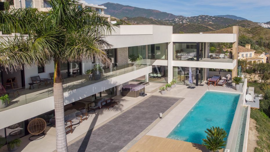 Moderne luxe villa met 5 slaapkamers en panoramisch uitzicht op zee in La Alquería, Benahavís