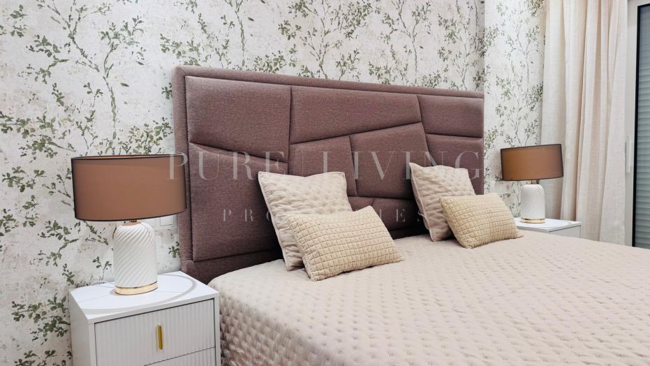 Magnifique appartement rénové de 2 chambres situé au rez-de-chaussée, dans le quartier de Nueva Alcántara.