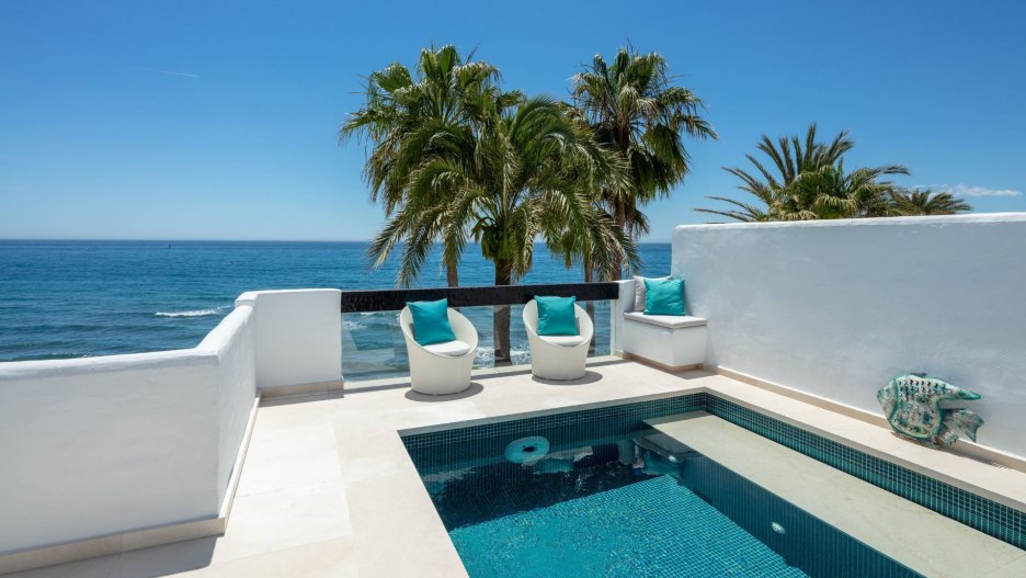 Image of a property for sale in Costa del Sol, Marbella, featuring stunning sea views and modern architecture.