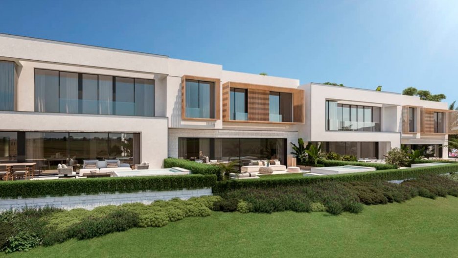 Image of an elegant townhouse for sale in La Cala Golf Resort, Mijas Costa, featuring golf course views.