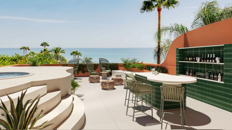 La Morera beachfront luxury duplex penthouse in Los Monteros beach, Marbella, Costa del Sol, Málaga. terrace off main bedroom with outdoor bar, jacuzzi with sea views.